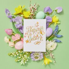 an easter card surrounded by flowers and eggs