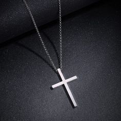 This sleek cross pendant adds protection and a unique look to your wardrobe. This elegant cross is a meaningful look you will appreciate. Discover all our sleek 925 silver jewelry for men and find a gift for him here. Materials: Made with white gold plated 925 sterling silver on a sterling silver rolo chain. Necklace Chain: 23.6 inches (60cm) long. Pendant Size: 36 x 20 mm. Chain Type：Rolo Chain Clasp Type: Lobster Claw Silver Mens Necklace, Silver Jewelry For Men, Sterling Silver Cross Necklace, Mens Necklace, Mens Silver Necklace, Jewelry For Men, Sterling Silver Mens, Necklace Online, Long Pendant