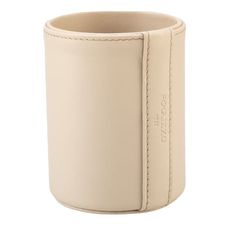 a cream colored leather cup with stitching on the outside and inside, sitting in front of a white background