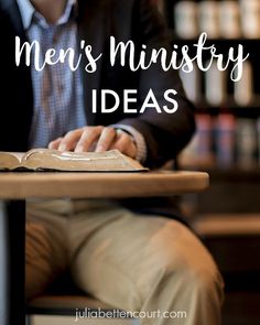 a man sitting at a table with a book in front of him and the words men's university ideas