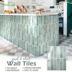 a kitchen with green tiles and white counter tops on the wall, along with an ad for simply home