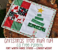 the christmas tree mug rug is made with fabric and has an applique on it