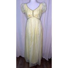 This Dress Is In Great Condition With No Tears, Or Holes. There Are Two Spots On The Dress (Pictured). If You Have Any Questions Please Feel Free To Ask. Flat Lay Measurements: Chest: 16 Inches Shoulder: 13 Inches Waist: 14 Inches Hip: 18 Inches Length: 56 Inches Coquette Fairy, Fairy Cottage, Brand Dresses, Pastel Yellow, Dress Picture, Floral Chiffon, Vintage 1970s, Yellow Floral, No Brand