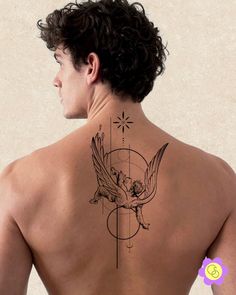 a man with a tattoo on his back