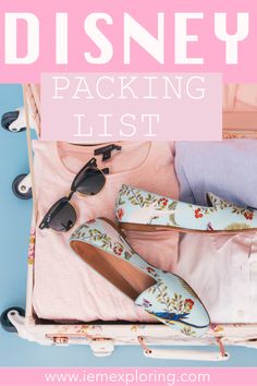 an open suitcase with clothes and shoes in it that says disney packing list on top