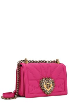 Dolce & Gabbana heart logo quilted pink flap bag in rosa. Features: adjustable chain and leather strap, snap button closure, interior pocket, 100% Lamb Leather Length: 8.5" Height: 5.75" Depth: 1.25" Made in Italy Pink Quilted Evening Bag, Elegant Pink Quilted Shoulder Bag, Pink Quilted Leather Bag, Marissa Collections, Heart Logo, Clothing Size Chart, Flap Bag, Shoulder Handbags, Snap Button