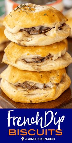 a stack of french dip biscuits sitting on top of a wooden cutting board with text overlay