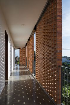 Ben Tre Hotel | Sanuki Daisuke architects Hotel Facade, Shigeru Ban, Facade Material, Architecture Design Drawing, Hotel Architecture, Natural Ventilation, Brick Patterns