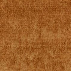 an orange colored fabric texture background