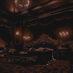 an ornate bedroom with chandelier and bed in it