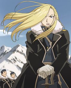 an anime character with long blonde hair standing in front of snow covered mountains and looking at the camera