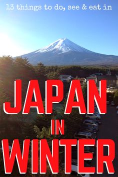 the words japan in winter are overlaided with cars and snow - capped mountains