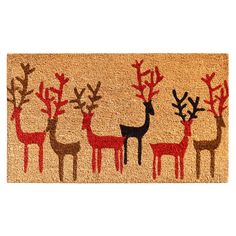 a door mat with deers and antlers painted on the front, in various colors