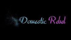 the words domestic red are lit up against a black background with pink and blue writing