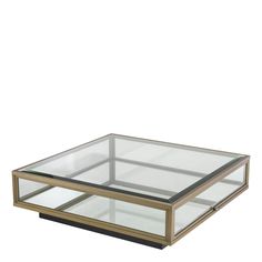 a glass and metal coffee table on white background