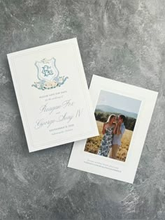 two wedding cards with an image of the bride and groom in blue, white and silver