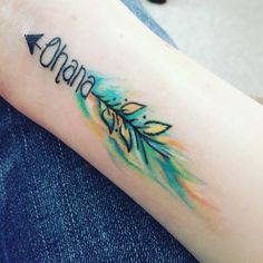 an arrow tattoo with the word ohana on it