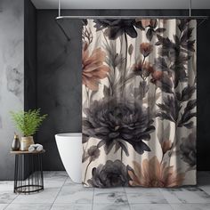 a bath room with a toilet and a shower curtain that has flowers printed on it