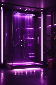 a bathroom with purple lighting and a shower