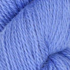 blue yarn is shown in this close up photo, it looks to be very soft