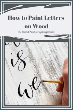 someone is painting letters on wood with the words, how to paint letters on wood