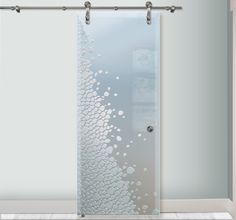 a glass door with water drops on it