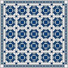 a blue and white quilt with squares on it