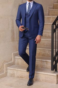 Redefine classic elegance with our Blue Slim-Fit Suit 3-Piece. The slim-fit silhouette and navy blue color make it a wardrobe essential for the modern gentleman. Embrace tailored excellence and make every occasion special.  #suit #suits #bluesuit #slimfit #singlebreasted #formalwear #menattire Blue Slim Fit Suit, Mens Tailored Suits, Suit Styles, Double Breasted Tuxedo, Suit Stores, Slim Fit Suit Men, Mens Tailor, Formal Men