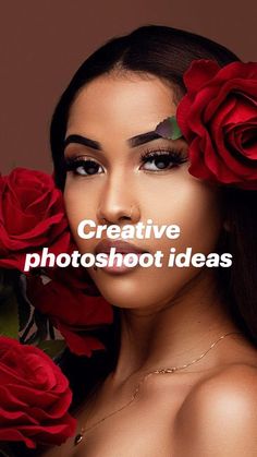 a beautiful woman with long hair and red roses in her hair is posing for the camera