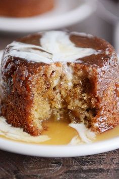 a piece of cake on a plate with icing