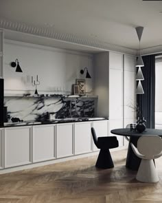 a modern kitchen with marble counter tops and white cabinets, along with black chairs in the center