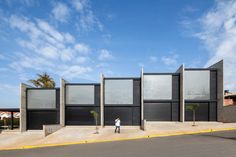 a person standing in front of a building