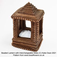 a decorative candle holder made out of woven material