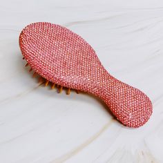 This hair brush is inspired by Barbie and adds a sparkling touch to your look. Channel your inner princess with this must-have tool! It offers a glamorous and practical solution for beautiful hair. Crafted with wooden bristles, this brush is gentle on hair and perfect for travel or everyday use. Keep your hair looking its best with this stylish and convenient accessory. Dimensions: 6" x 2.7" x1.5" Rhinestones, wooden brush Made in China Wooden Brush, Glam Hair, Hair Setting, It Girl, Girls Life, Scrunchie Hairstyles, Hair Accessories Headbands, Steel Jewelry, Headband Hairstyles