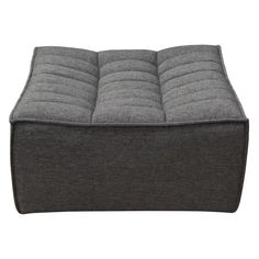 a gray ottoman that is sitting on a white background