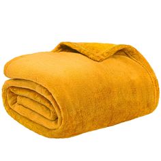 a yellow blanket folded on top of each other