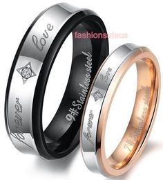 two wedding bands with the names of each couple on them, one is black and one is