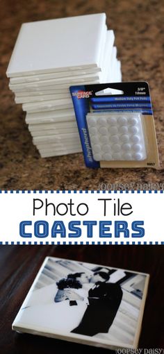 a stack of white coasters sitting on top of a table next to a card