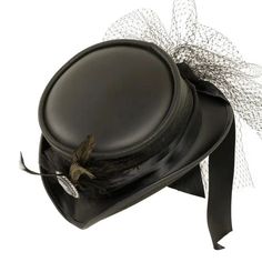 Fancy | Womens Victorian Leather Top Hat combines vintage charm with modern sophistication. Crafted from lightweight USA-made leather, this top hat is adorned with a satin black band and delicate mesh overlay, featuring a bow closure at the back and an antique medallion with feathers. Perfect for making a bold, elegant statement. Material: Lightweight USA Made Leather Shape: Top Hat Trim: Satin Black Band with Mesh Overlay, Bow Back Closure, and Antique Medallion with Feathers Brim Size: 2” Crow Vintage Black Leather Hat Bands, Black Leather Steampunk Top Hat, Elegant Black Leather Hat, Elegant Black Leather Hat Band, Leather Top Hat, Antique Medallion, American Hat Makers, Mesh Bows, Quality Hats