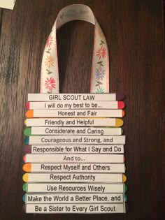 Girl Scout Hangers, October Girl Scout Meeting Ideas, Girl Scout Law Activities, Girl Scout Ideas Activities, Girl Scout Craft Ideas, Girl Scout Promise Craft, Girl Scout Law Craft