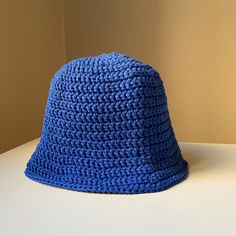 Excited to share the latest addition to my #etsy shop: Hand knit cotton bucket hat, trendy crochet bucket hat #cottonknithat #cottonbuckethat #knitbuckethat #crochetbuckethat #mencrochethat #womencrochethat #handknitbuckethat Blue Bucket Hat For Summer, Blue Bucket Hats For Summer, Trendy Blue Crochet Hat For Summer, Trendy Knitted Hat With Short Brim, Trendy Cotton Hat One Size, Trendy Winter Bucket Hat For Vacation, Casual Blue Brimmed Cloche Hat, Trendy Blue Bucket Hat For Winter, Trendy Cotton One-size Hats