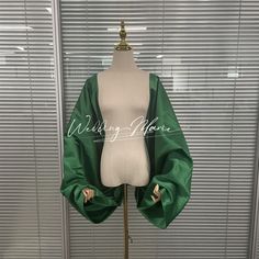 Item: Detachable Sleeves Fabric: Satin Color : Green  White Custom Color Shoulder Width: 21 Inch Arm Length: 20 Inch Custom Size  NOTE: * We support custom sleeves, custom color and fabric, if you have any problems of the sleeves, please leave me messages. *We support custom veil: custom length and color, add blusher, add appliques/lace, make cape veil, hooded cape veil, mantilla veil. Please contact me about your thoughts of the veil. *We support custom veil: We offer customized veils tailored Hooded Cape Veil, Robe Dote, Shawl For Dress, Veil Mantilla, Custom Veil, Cape Veil, Dress Shawl, Satin Shawl, Mantilla Veil