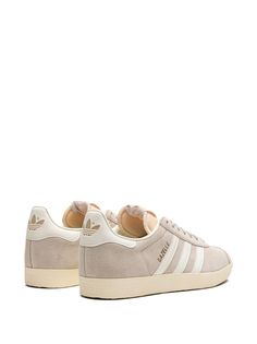 Find ADIDAS Gazelle Wonder Beige Sneakers on Editorialist. beige/white suede logo print to the side signature 3-Stripes logo round toe front lace-up fastening logo patch at the tongue branded heel counter flat rubber sole These styles are supplied by a premium sneaker marketplace. Stocking only the most sought-after footwear, they source and curate some of the most hard to find sneakers from around the world. Leather Lace-up Sneakers With Three Stripes Branding, Leather High-top Sneakers With Three Stripes Branding, Leather Lace-up High-top Sneakers With Three Stripes Branding, Cream Suede Sneakers For Streetwear, Classic Adidas Suede Sneakers, Cream Suede Sneakers With Rubber Sole, Adidas Sneakers With Three Stripes And White Sole, Classic Beige Sneakers With Rubber Sole, White Suede Adidas Logo Sneakers