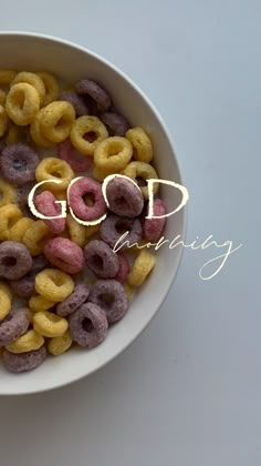 a bowl full of cereal with the word god above it