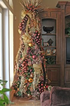 a decorated christmas tree in a living room