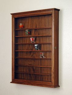 a wooden shelf with glasses on it