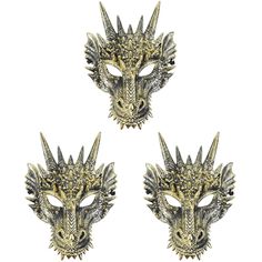 three gold and silver dragon masks with spikes on their heads, one is facing the camera