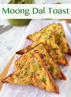 three pieces of toast with toppings on top and the words moong dal toast above it