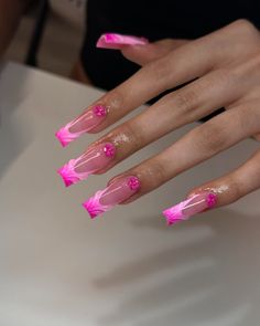 As a professional manicurist, I always recommend bright summer nails to make a bold statement. The hot pink coffin nails in this design are complemented by delicate floral accents, creating a striking yet feminine look. The length and shape of these nails provide ample canvas for intricate designs while maintaining a chic aesthetic.   Photo credit by: @klaws.by.kenny Cute Airbrush Nails, Nails Set Ideas, Nail Tech Instagram Posts, Latin Nails, Nails With Flower Design, Pigment Nails, Square French Tip, Textured Nails, Ongles Gel French