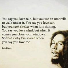 bob marley quote about love and life on white paper with black inked photograph in background